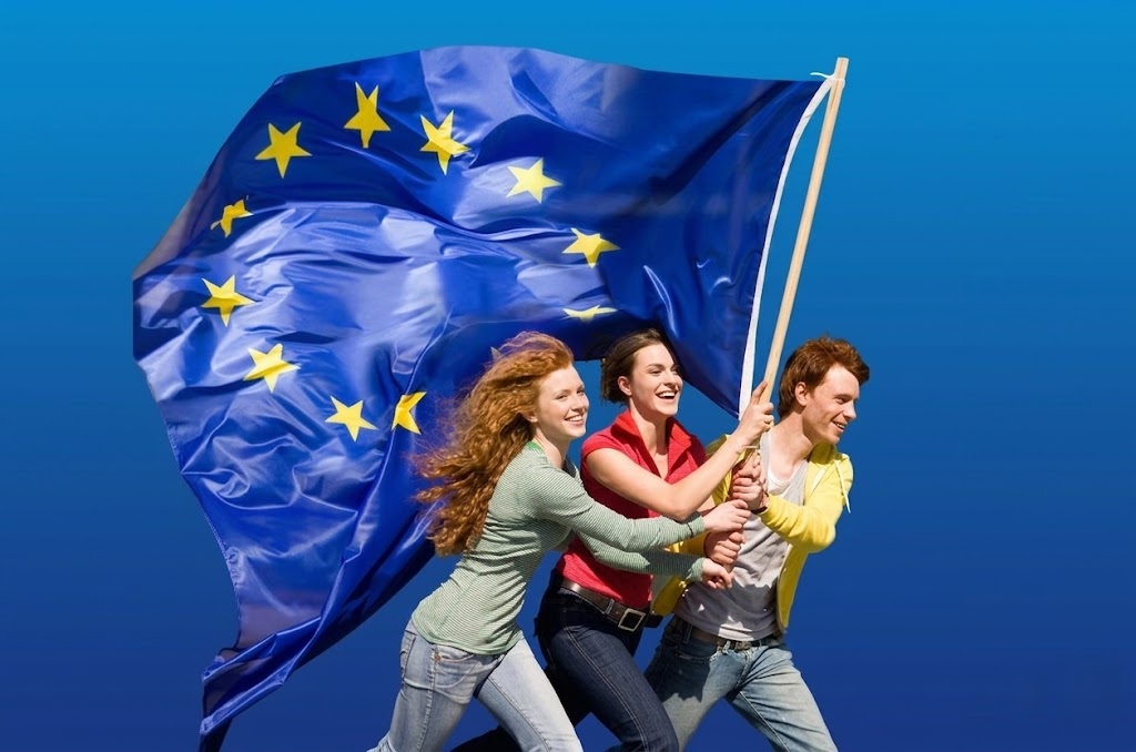 Young people collaborating on an art project in a European cultural space